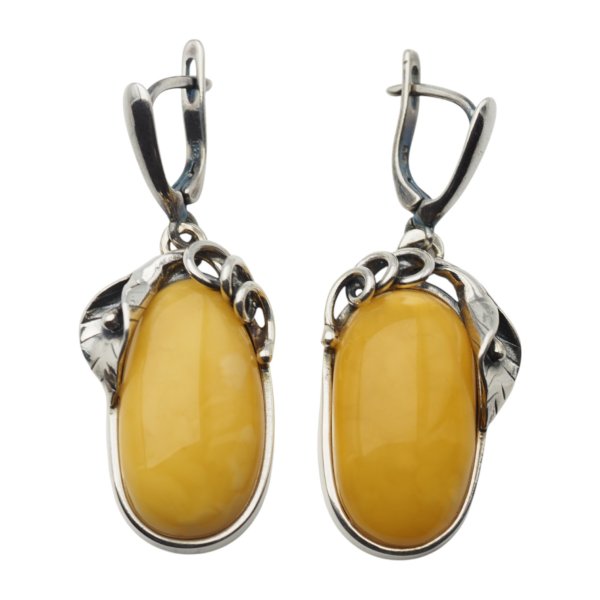 Bursztyn mleczny w srebrze oksydowanym - kolczyki owalne z liśćmi