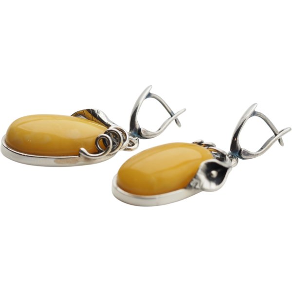 Bursztyn mleczny w srebrze oksydowanym - kolczyki owalne z liśćmi