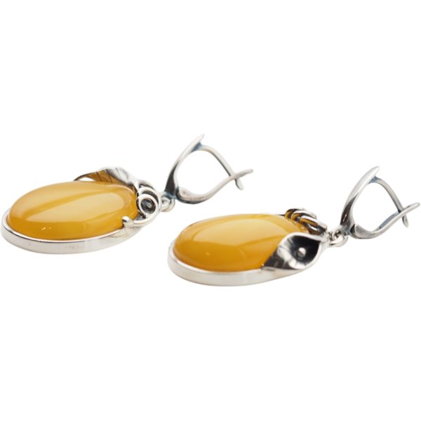 Bursztyn mleczny w srebrze oksydowanym - kolczyki owalne z liśćmi