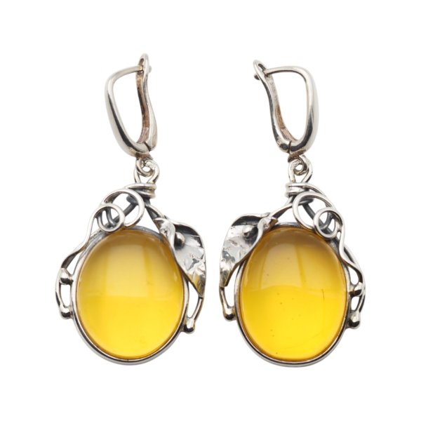 Bursztyn transparentny ze szczątkami organicznymi w srebrze oksydowanym - kolczyki owal z liśćmi
