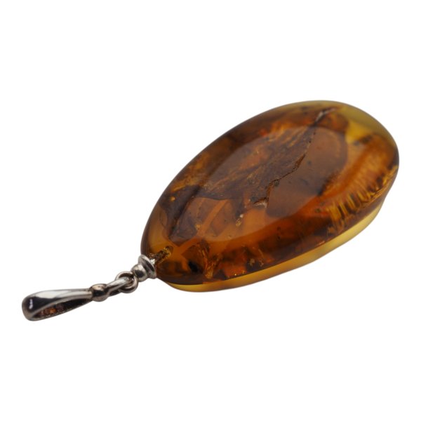 Bursztyn z inkluzją roślinną i srebro rodowane - zawieszka