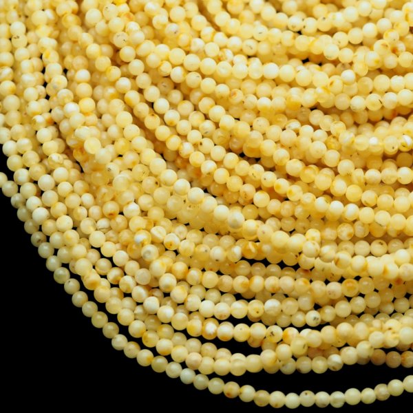 Bursztyn mleczny polerowany kulka 3,6-3,9 mm (sznur 42 cm)