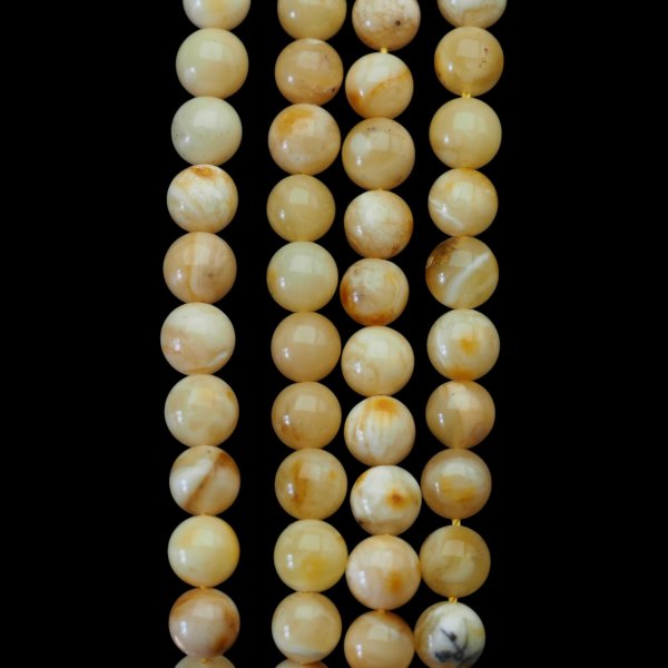 Bursztyn mleczny polerowany kulka 7,2-7,4 mm (sznur 38,5 cm)