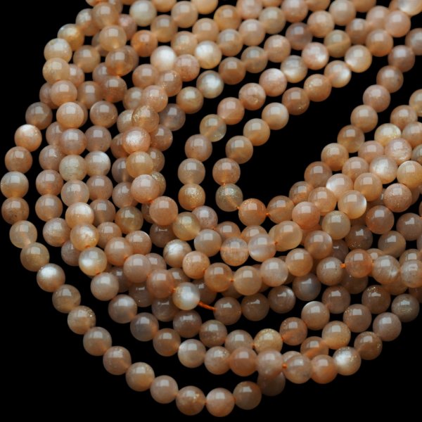 Kamień Słoneczny polerowane kulki 6,5 mm (sznur)