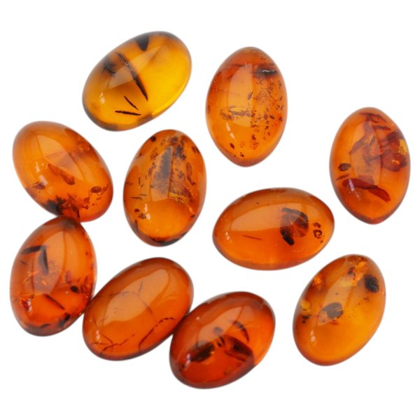 Bursztyn koniakowy kaboszony owalne 15x10 mm – pakiet 10 szt.