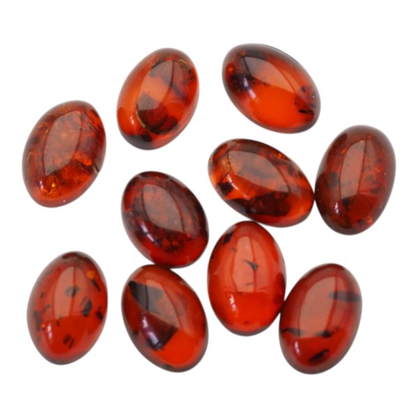 Bursztyn koniakowy kaboszony owalne 14x10 mm – pakiet 10 szt.