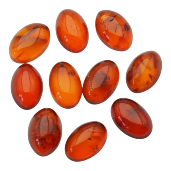 Bursztyn koniakowy kaboszony owalne 15x10 mm – pakiet 10 szt.