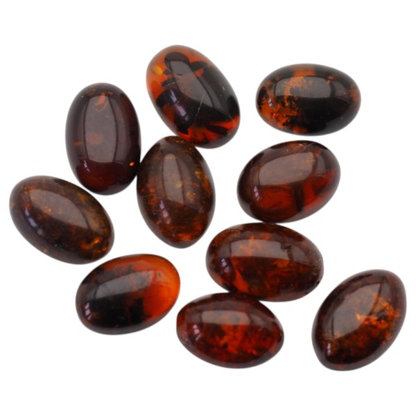 Bursztyn koniakowy kaboszony owalne 14x10 mm – pakiet 10 szt.