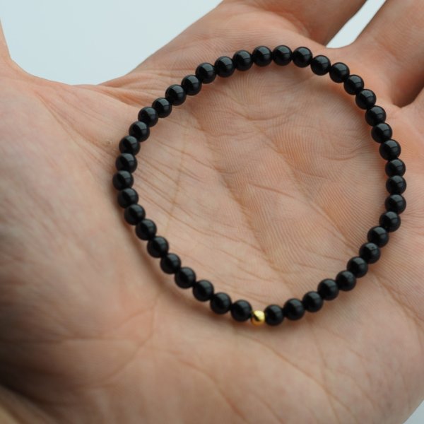 Bransoletka z czarnego Turmalinu 6 mm – elastyczna, srebro 925 złocone
