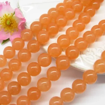Jadeit pastelowy pomarańczowy kulki 10mm (sztuka lub sznur)