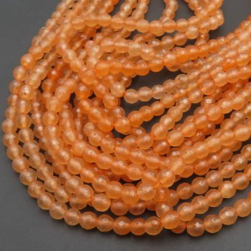 Jadeit pomarańczowy fasetowany kulki 6 mm (sznur)
