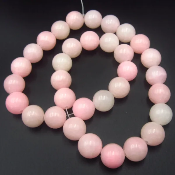 Jadeit różowy kulki 12 mm(sznur)