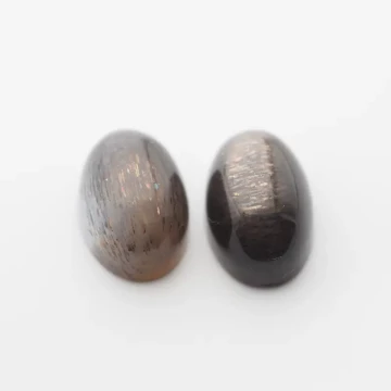 Kamień Słoneczny 14x10x7-7,5 mm owal (para)