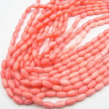 Koral różowy ryż 9x5 mm (sznur)