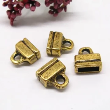 Metal złocony - końcówki ozdobne 9x3 mm