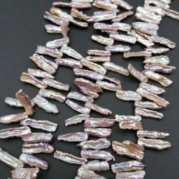Perły Naturalne Hodowane fioletowe patyczki <br>16-25x6 mm (sznur)
