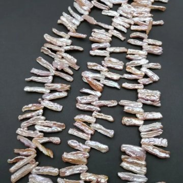 Perły Naturalne Hodowane różowe patyczki <br>16-25x6 mm (sznur)