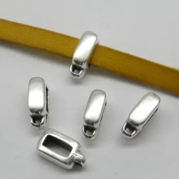 Posrebrzane - metalowy element ozdobny 9x4 mm