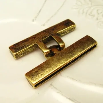 Posrebrzane w kolorze złotym - metalowe końcówki do linek rzemieni 39x2,5 mm(para)