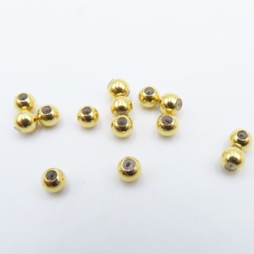 Srebro Ag złocone - kulka 3mm z silikonem do sznurków