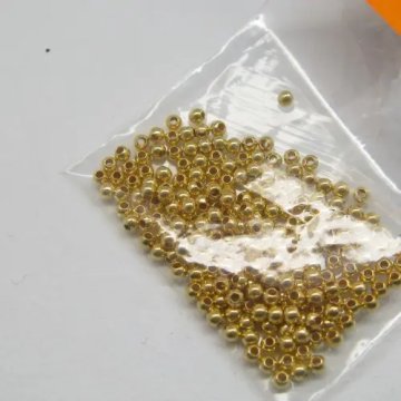 Srebro Ag złocone - kulka gładka zaciskowa 2mm (50sztuk)  