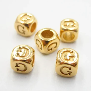 Srebro Ag złocone - przekładka kostka z literą G